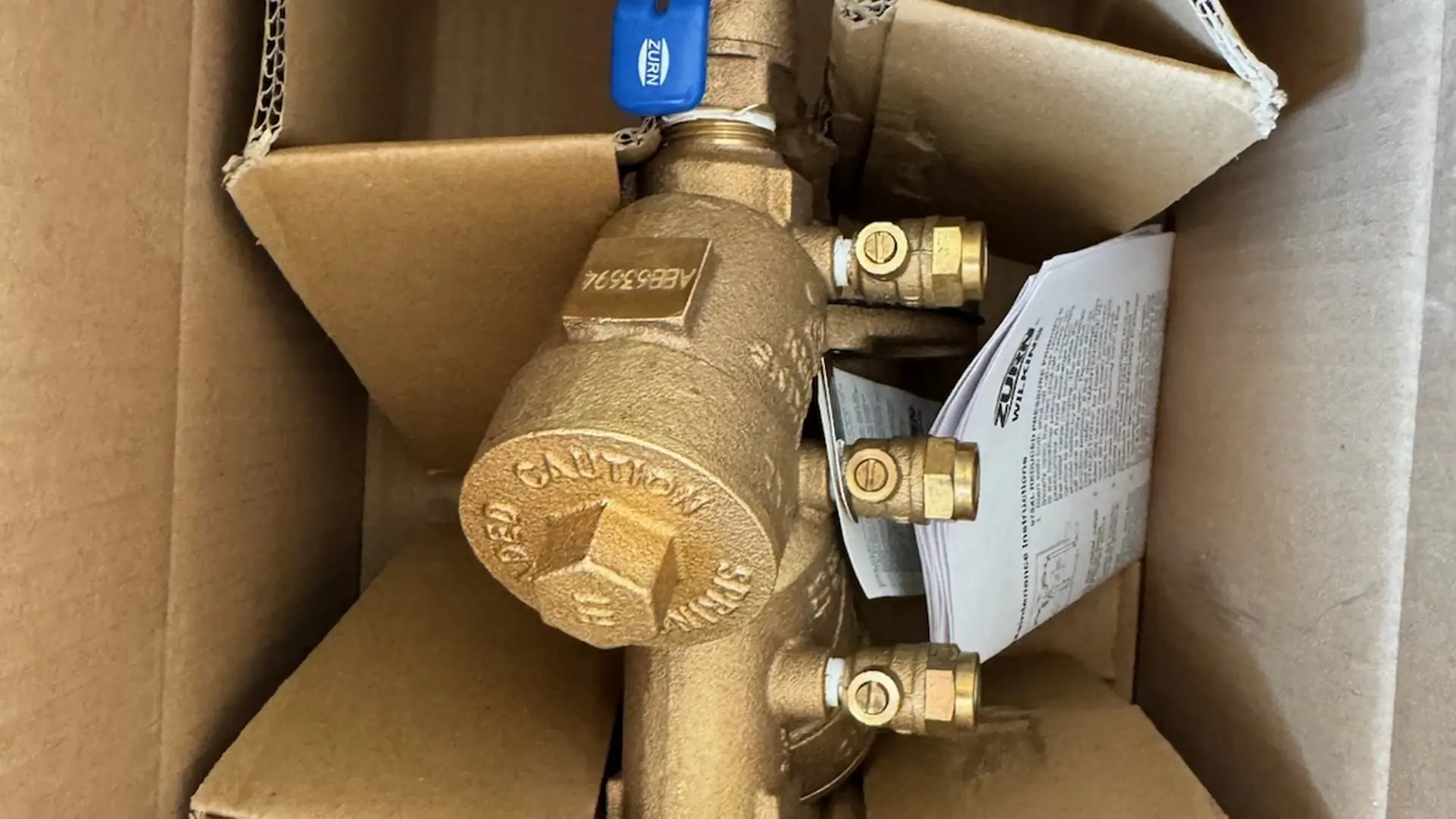 New brass backflow preventer assembly ready for installation