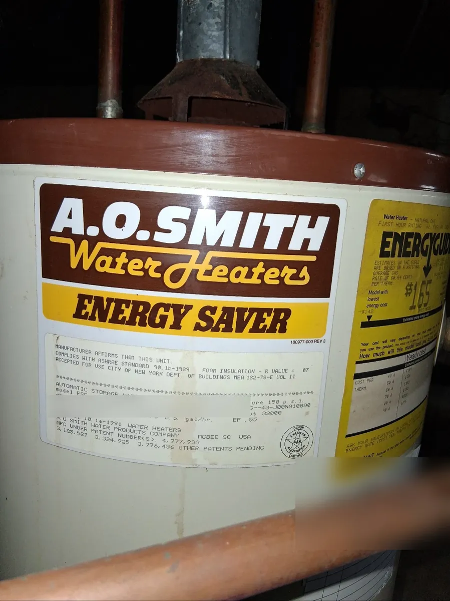 A.O. Smith Energy Saver water heater nameplate and yellow EnergyGuide label